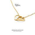 Gold plated double heart pendant necklace on a delicate chain, modern jewelry design